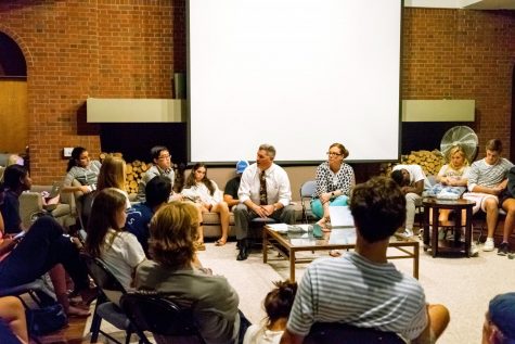 Dr. Arthur Gibb, dean of community life, and Mrs. Heather Perrenoud, dean of residential life, address students last Monday.