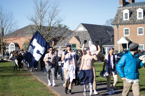 The Blue Mob walks down to the ’49 Fields to cheer on sports teams.