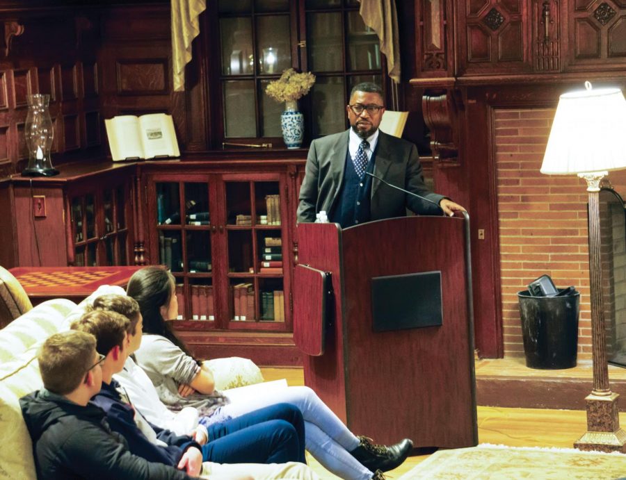 Major Jackson recites his poetry for a student audience
at the Harris House on Thursday, October 25.  
