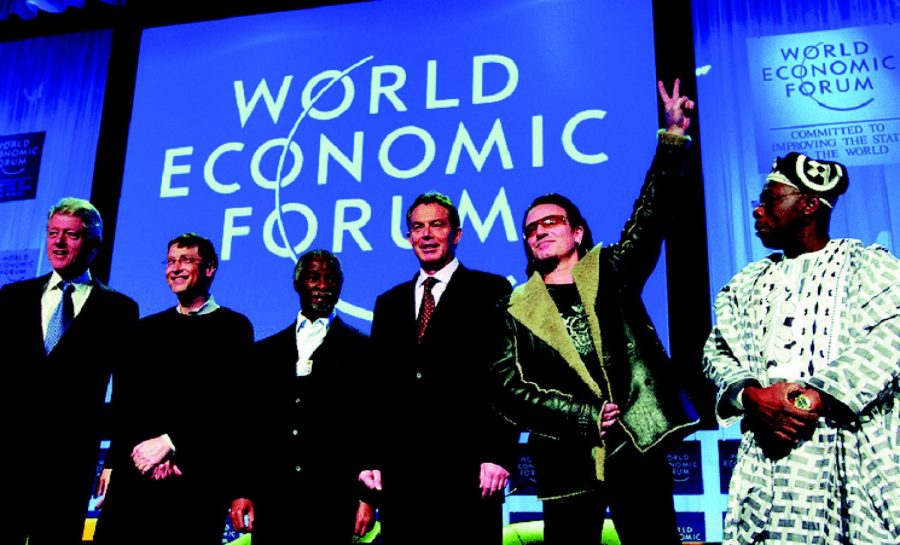 Bill Clinton, Bill Gates, Thabo Mbeki, Tony Blair, Bono, and Olusegun Obasanjo convene at
the World Economic Forum in Davos, Switzerland.