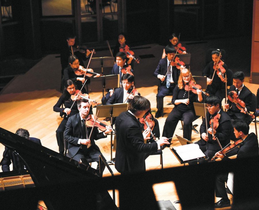 Fabio Witkowski conducts the Philharmonic Orchestra during its debut concert in Elfers Hall.