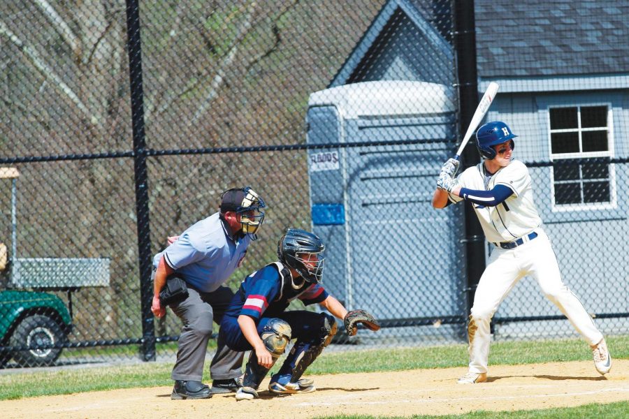 Tommy Lewis ’19 anticipates a pitch in a game against Kent on May 1. 