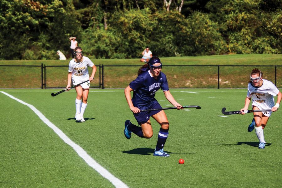 Sandrine Brien ’20 dribbles the ball up the field.