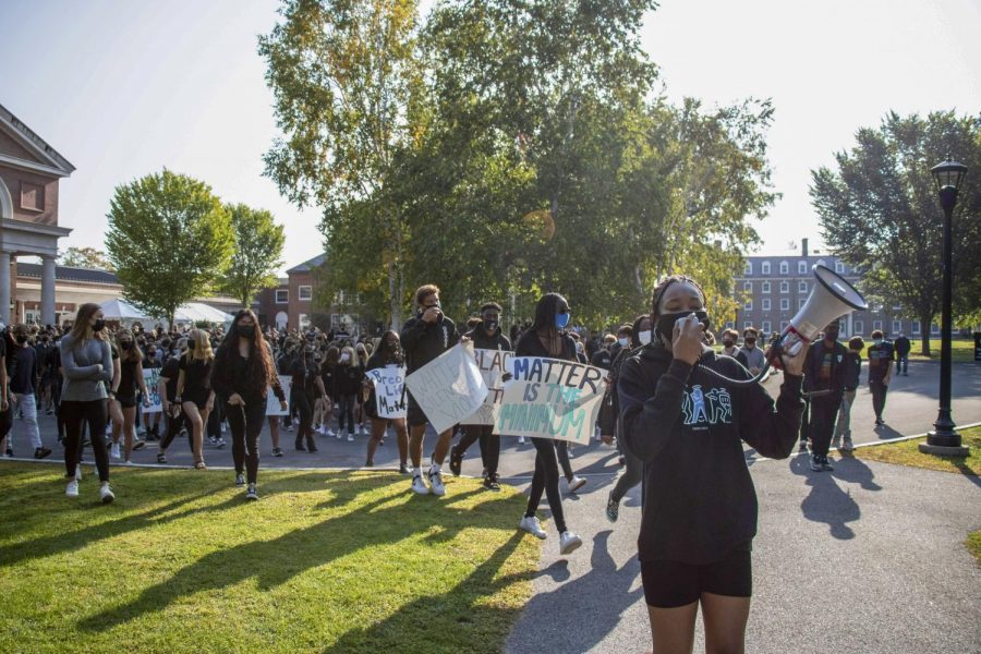 Students gathered in Main Circle to march down to Sprole Field during the demonstration.