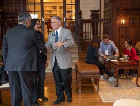 Mr. Bradley greets parents during the 2019 Family Weekend.