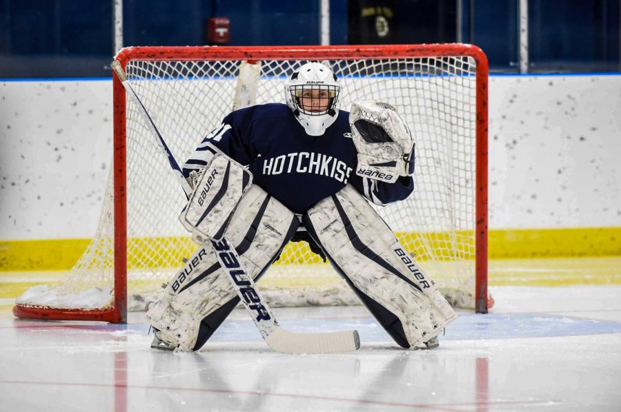 Hatch plays goalie for Girls Varsity Hockey in a game during last years season.