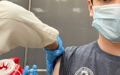 Carter Moyer ’20 sported  Minerva pride when he received his COVID vaccine. 