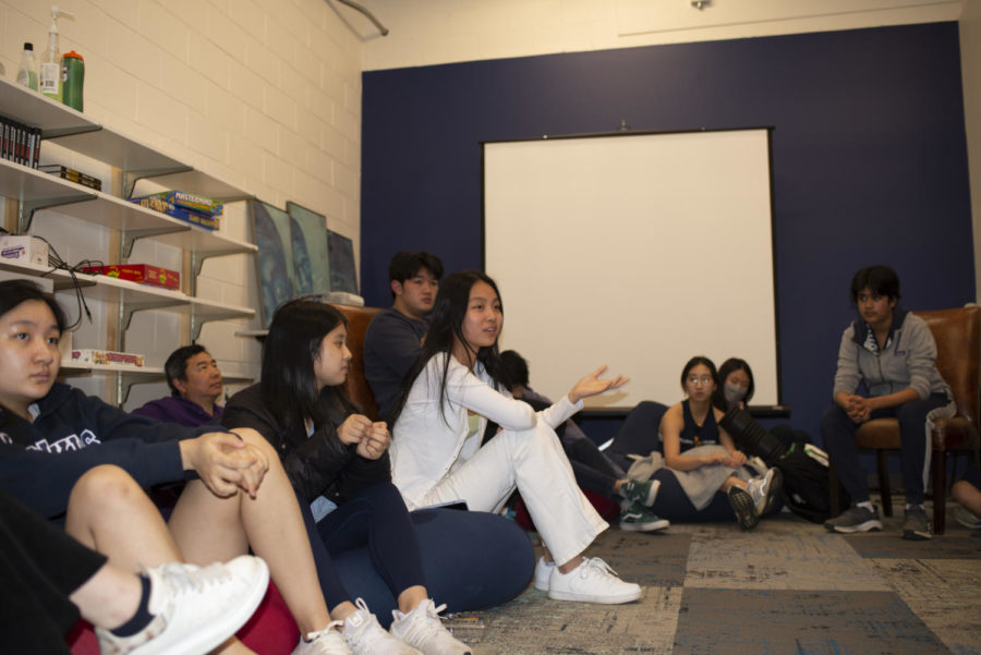 Pan-Asian students gather to discuss the all-school presentation.
