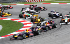 Drivers race in a Formula One event from the 2010 season.
