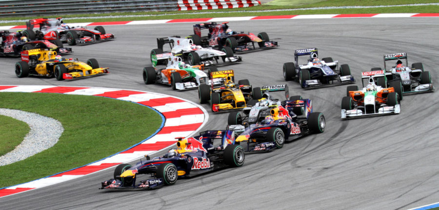 Drivers race in a Formula One event from the 2010 season.