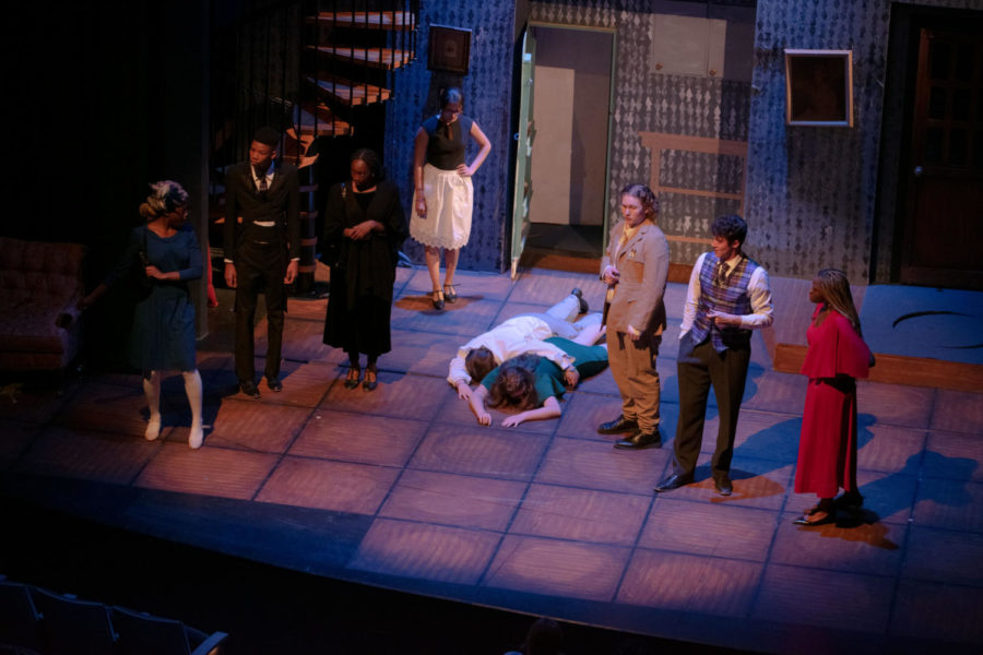 The murdered Cook
falls onto Ms. Green
in a dramatic scene
in the play.