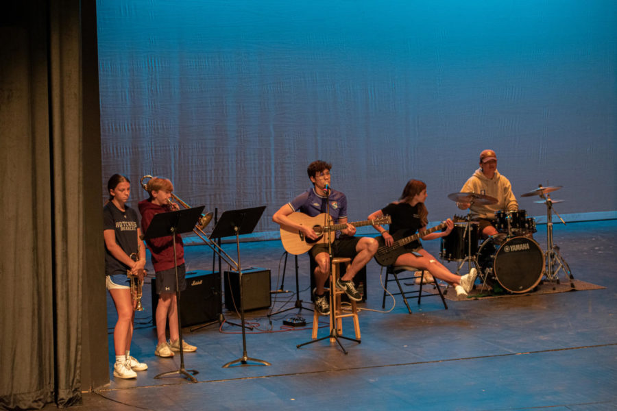 Musicians and vocalists
rehearse in Walker.