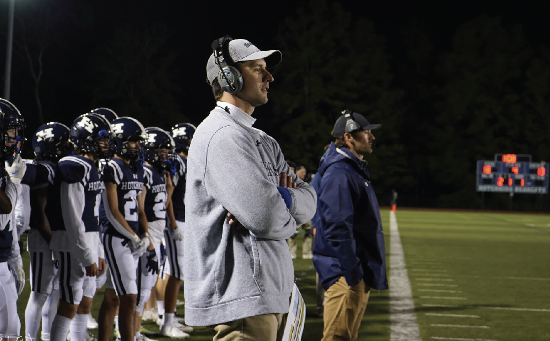 Coach Quinn directs from the sidelines at the game against Trinity Pawling last Friday night.