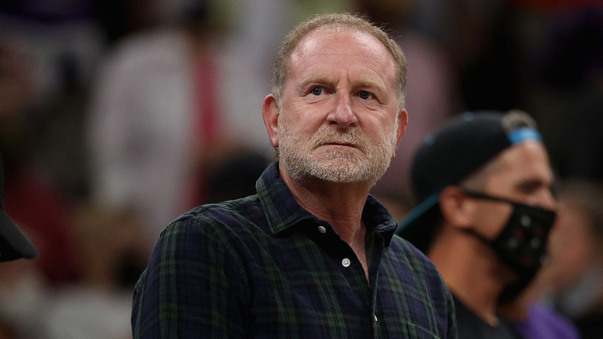 Phoenix Suns owner Robert Sarver watches a game at his team’s arena.