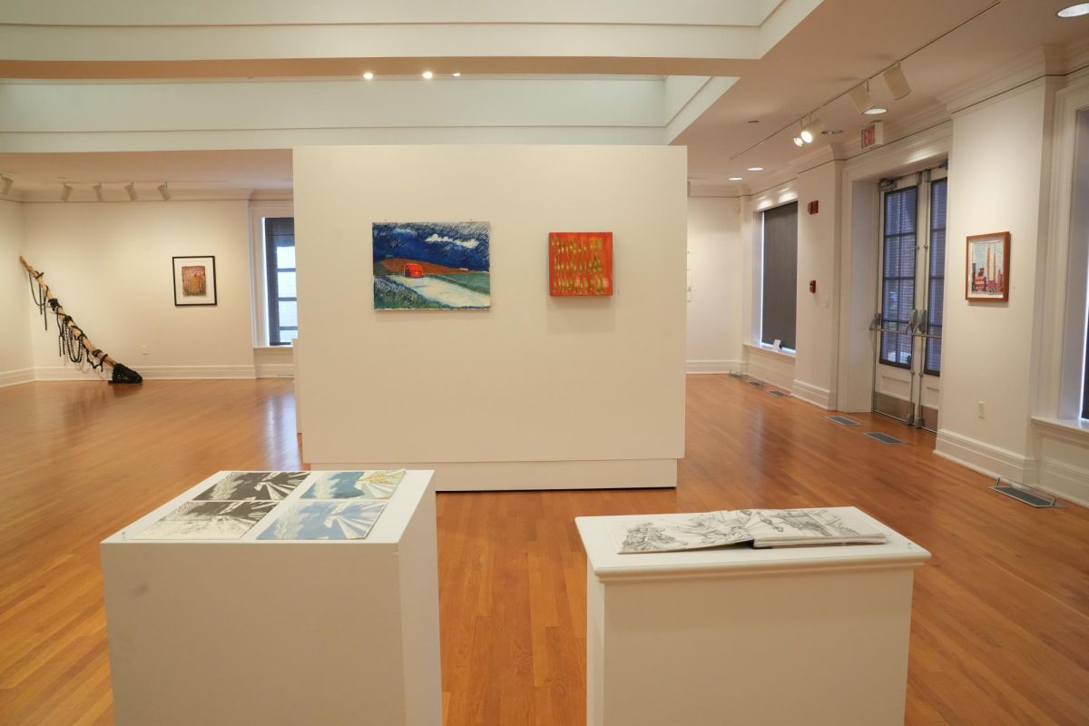 The exhibit features 36 pieces, including sculptures, collages, paintings, and prints.